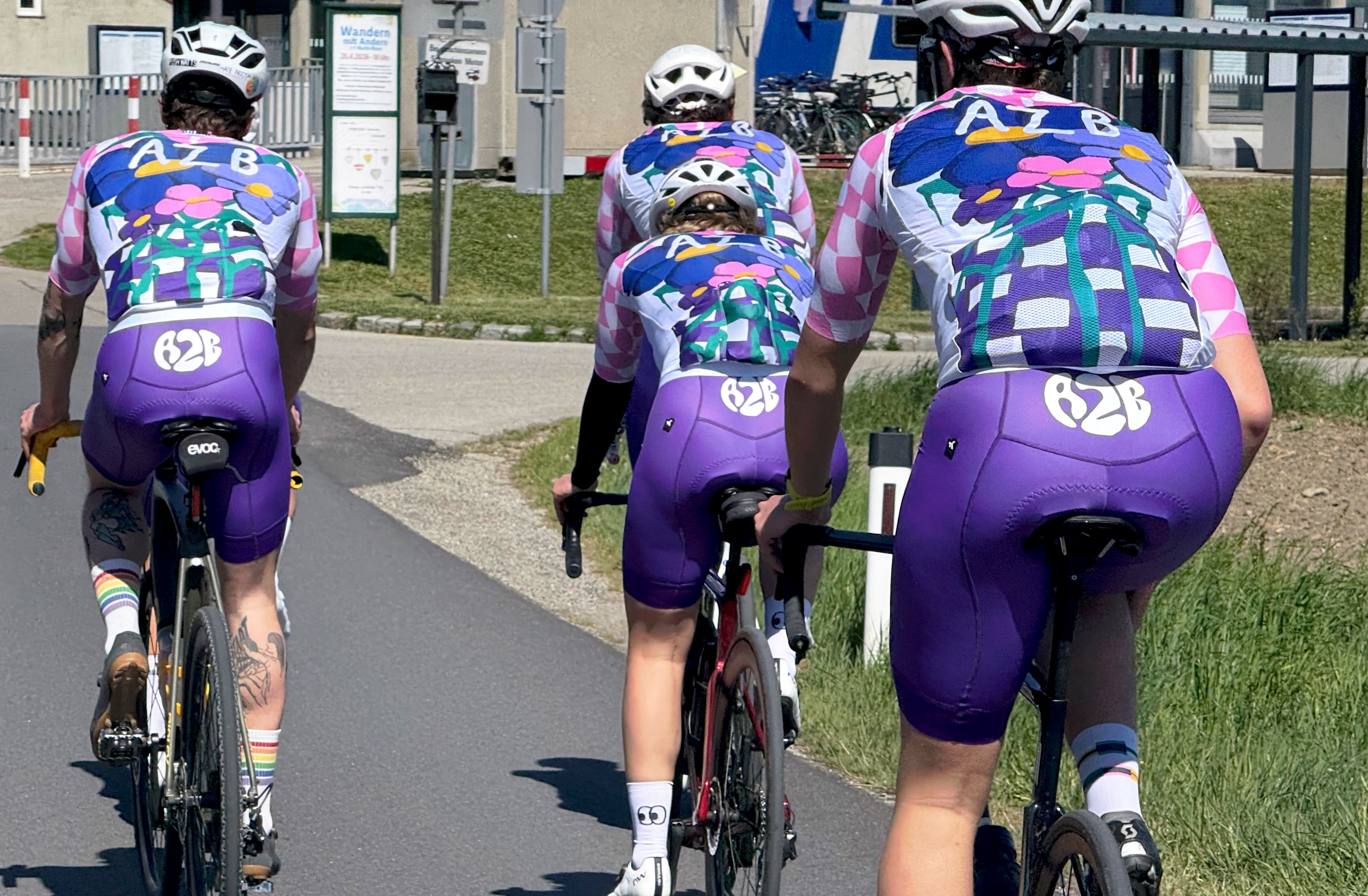 AZB riders in the gingham kit rolling out of Vienna